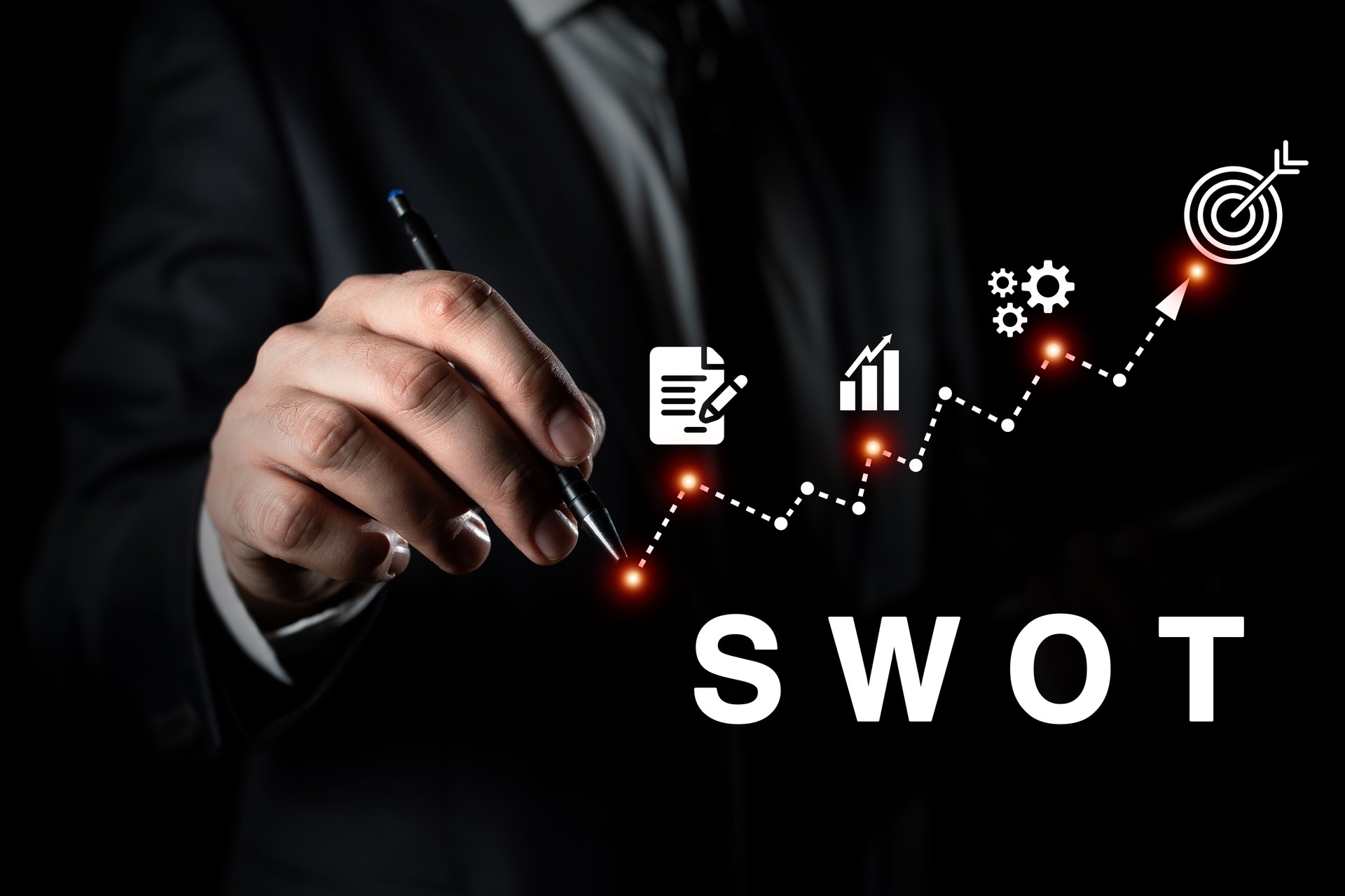 Businessman Drawing SWOT Analysis Diagram with Growth Icons on Dark Background